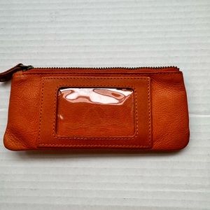 Pumpkin color orange wallet.